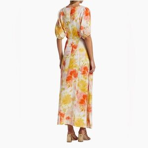 KIVARI's Genevieve tie front midi dress  
Crewneck
Short sleeves
Back-zip